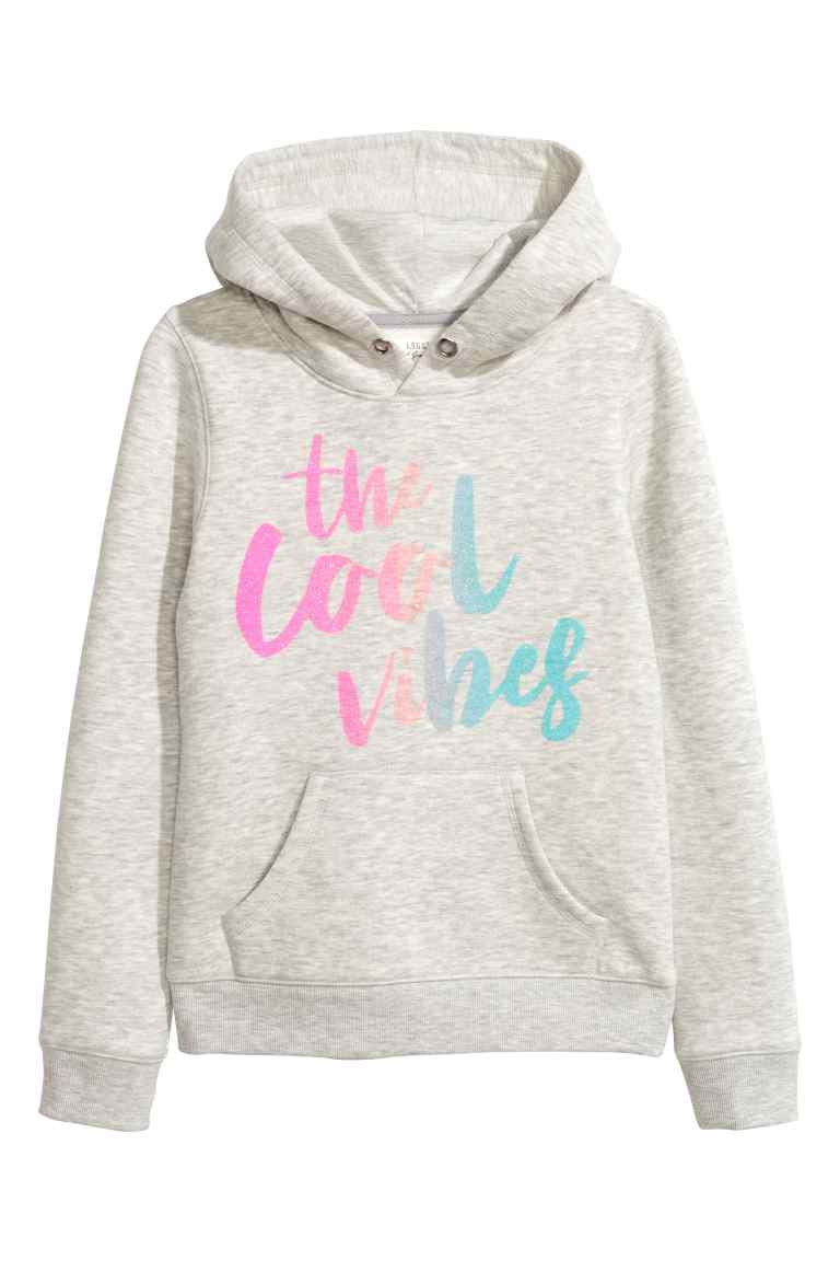 Hooded top with a text motif